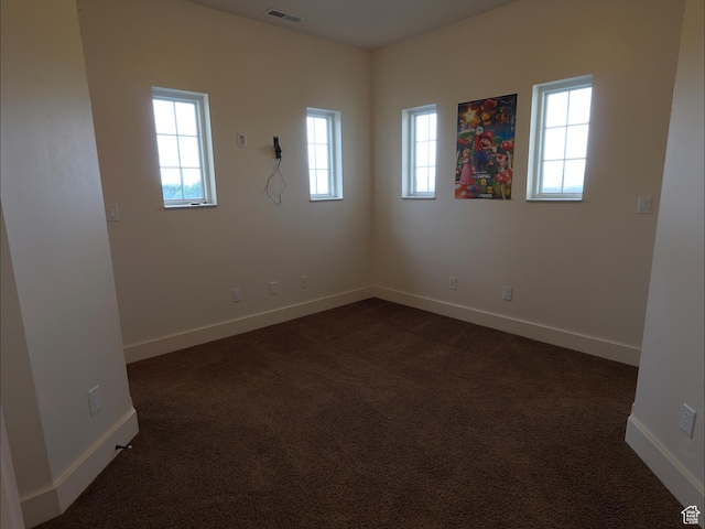 2307 Maple Leaf Dr, Cove, UT 84320 - unfurnished room with baseboards and dark carpet