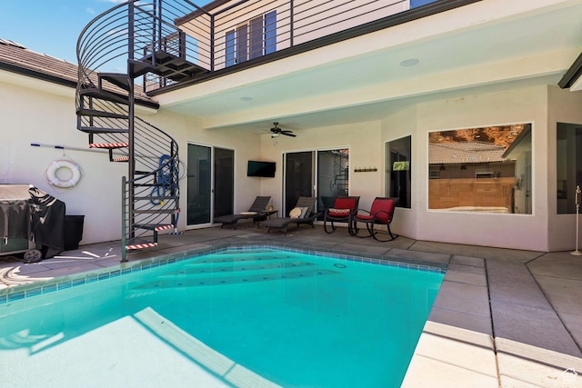 536 N Creek Cir, Washington, UT 84780 - outdoor pool featuring a ceiling fan and a patio