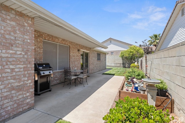 1040 S 1100 E Unit 80, St George, UT 84790 - view of patio / terrace featuring a grill and outdoor dining space