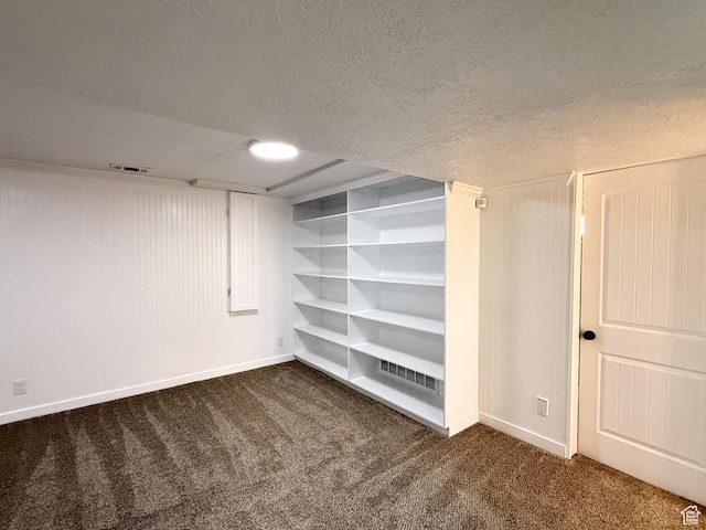 5432 S 800 E, South Ogden, UT 84405 - finished below grade area featuring carpet, baseboards, and a textured ceiling