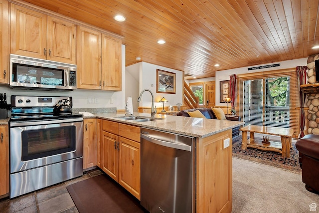 3988 N Timber Wolf Ln Unit 10D, Park City, UT 84098 - kitchen featuring stainless steel appliances, a sink, wooden ceiling, a peninsula, and light stone countertops