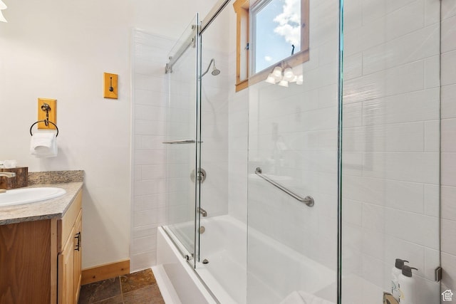 3988 N Timber Wolf Ln Unit 10D, Park City, UT 84098 - full bathroom featuring baseboards, vanity, and combined bath / shower with glass door