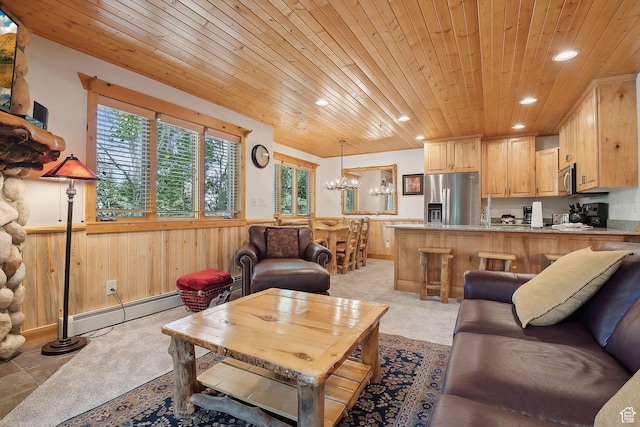 3988 N Timber Wolf Ln Unit 10D, Park City, UT 84098 - living room featuring recessed lighting, wooden ceiling, a chandelier, a baseboard heating unit, and wainscoting