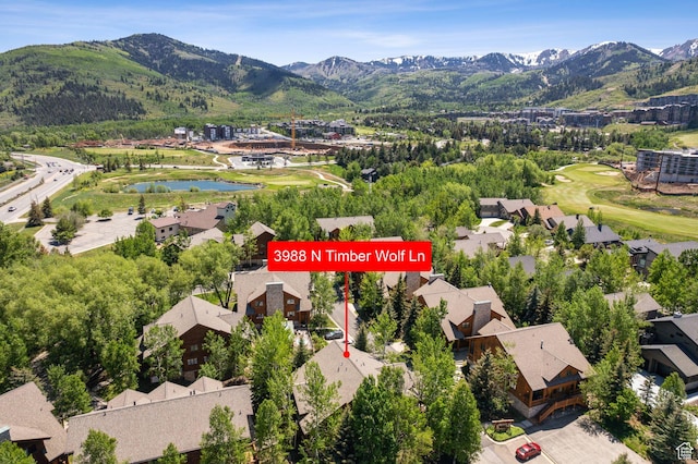 3988 N Timber Wolf Ln Unit 10D, Park City, UT 84098 - aerial view of residential area with a water and mountain view and a golf course