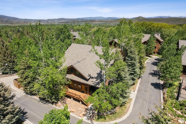 3988 N Timber Wolf Ln Unit 10D, Park City, UT 84098 - view from above of property featuring a mountain backdrop and a heavily wooded area