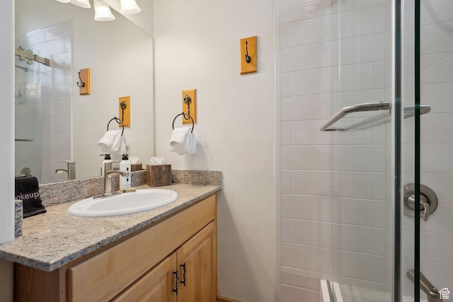 3988 N Timber Wolf Ln Unit 10D, Park City, UT 84098 - bathroom featuring vanity and a shower stall