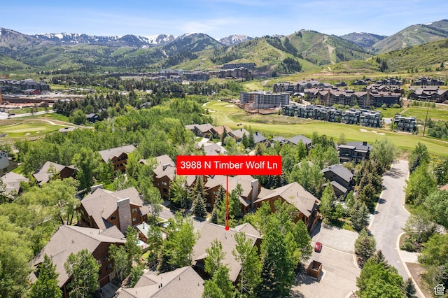 3988 N Timber Wolf Ln Unit 10D, Park City, UT 84098 - aerial perspective of suburban area with mountains and a golf club