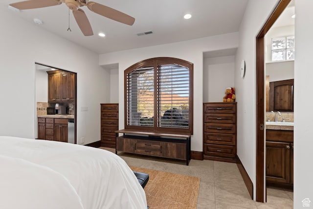 2763 N Chaco Trl, St George, UT 84770 - bedroom featuring ensuite bathroom, light tile patterned floors, baseboards, recessed lighting, and a sink