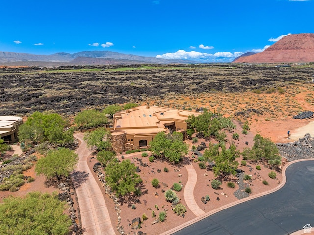 2763 N Chaco Trl, St George, UT 84770 - view from above of property with a mountain backdrop and a desert landscape