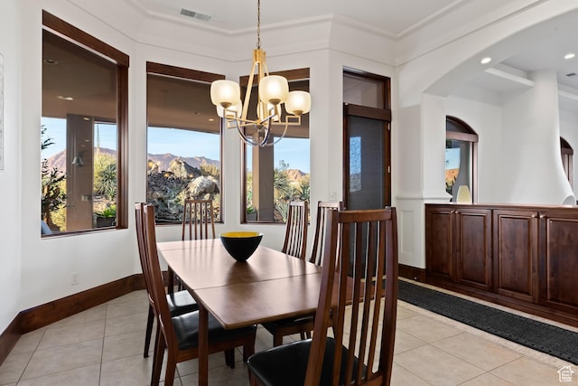 2763 N Chaco Trl, St George, UT 84770 - dining room with light tile patterned flooring, a chandelier, healthy amount of natural light, and baseboards