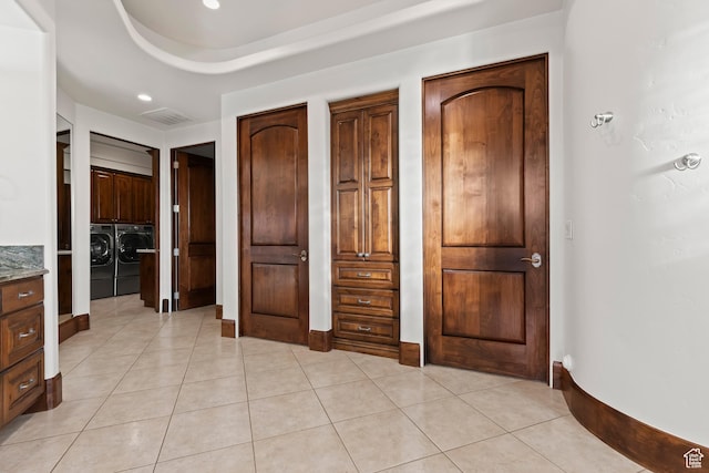 2763 N Chaco Trl, St George, UT 84770 - unfurnished bedroom with washing machine and dryer, light tile patterned floors, baseboards, and recessed lighting