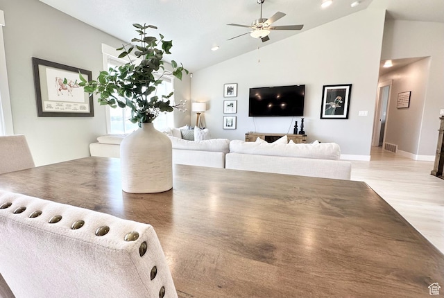 5154 N Blackbrush Dr, Eagle Mountain, UT 84005 - living area featuring vaulted ceiling, ceiling fan, and light wood-style flooring