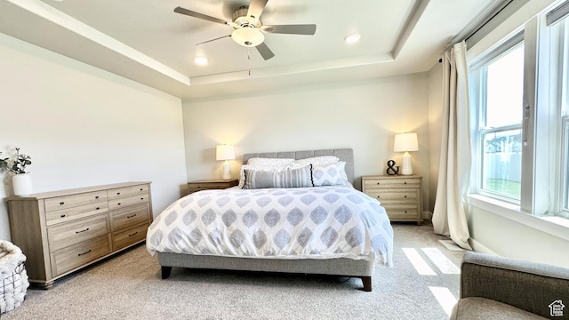 5154 N Blackbrush Dr, Eagle Mountain, UT 84005 - bedroom featuring multiple windows, light colored carpet, a tray ceiling, and recessed lighting