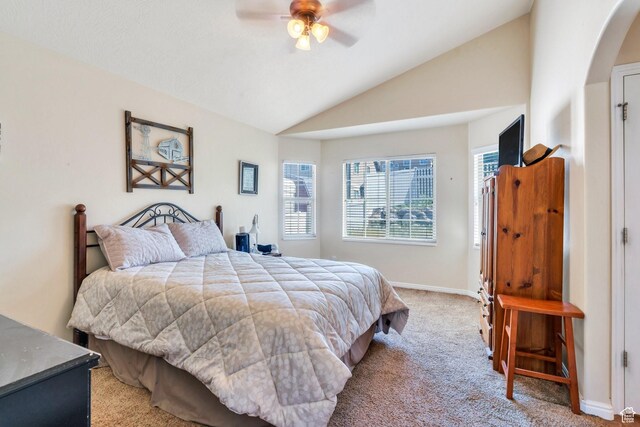 6329 W Basin Ridge Dr, West Valley City, UT 84128 - bedroom with light carpet, lofted ceiling, arched walkways, baseboards, and a ceiling fan