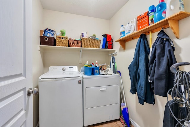 6329 W Basin Ridge Dr, West Valley City, UT 84128 - laundry area featuring washer and clothes dryer and baseboards