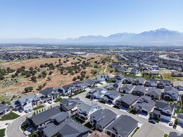 14908 S Fawley Ln, Herriman, UT 84096 - aerial view of property and surrounding area featuring a mountainous background and nearby suburban area