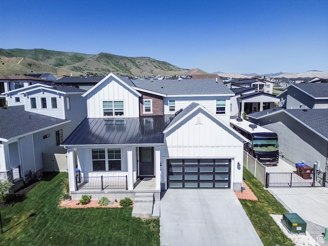 14908 S Fawley Ln, Herriman, UT 84096 - modern farmhouse style home featuring board and batten siding, a porch, concrete driveway, and a residential view