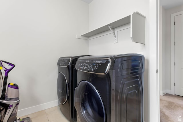 14908 S Fawley Ln, Herriman, UT 84096 - washroom with washing machine and clothes dryer, baseboards, and light tile patterned floors
