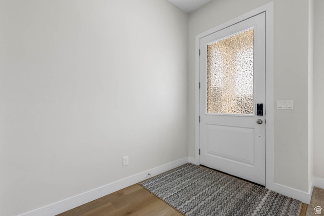 14908 S Fawley Ln, Herriman, UT 84096 - doorway featuring baseboards, plenty of natural light, and wood finished floors
