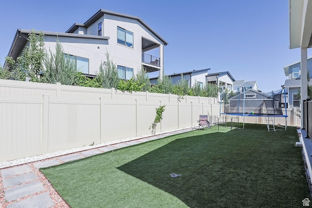 14908 S Fawley Ln, Herriman, UT 84096 - view of yard featuring a trampoline