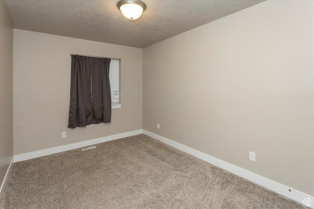 1704 E Talon Way, Eagle Mountain, UT 84005 - carpeted spare room with a textured ceiling and baseboards