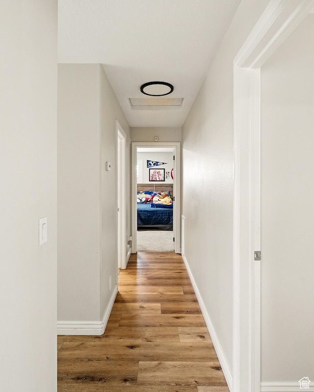 2271 W Crestview Cir, Cedar City, UT 84720 - hallway featuring light wood-type flooring and baseboards