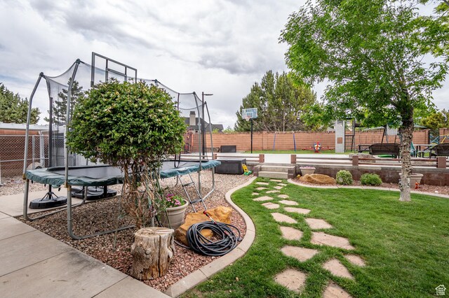 2271 W Crestview Cir, Cedar City, UT 84720 - view of yard featuring a trampoline