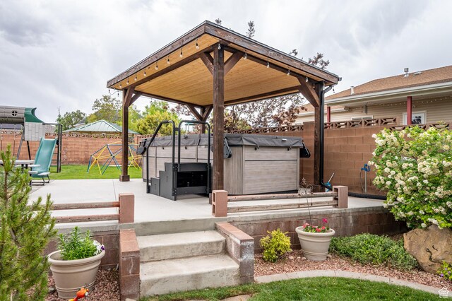 2271 W Crestview Cir, Cedar City, UT 84720 - fenced backyard with a patio, a playground, and a gazebo