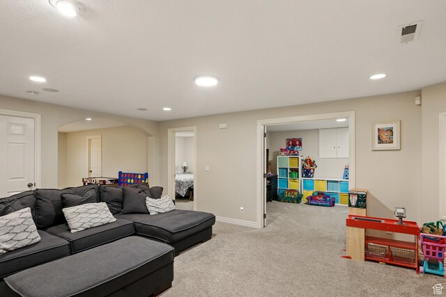 2271 W Crestview Cir, Cedar City, UT 84720 - living room featuring arched walkways, carpet, recessed lighting, and baseboards