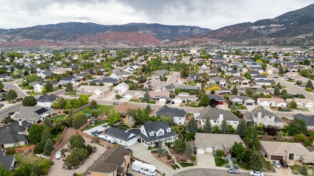 2271 W Crestview Cir, Cedar City, UT 84720 - aerial view of property's location featuring a mountainous background and nearby suburban area
