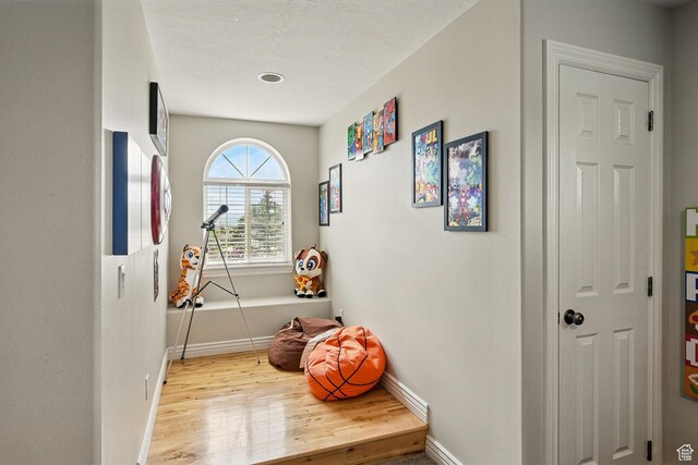 2271 W Crestview Cir, Cedar City, UT 84720 - hallway featuring wood finished floors and baseboards