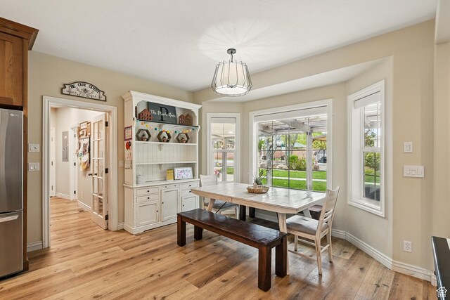 2271 W Crestview Cir, Cedar City, UT 84720 - dining space featuring light wood-type flooring and baseboards
