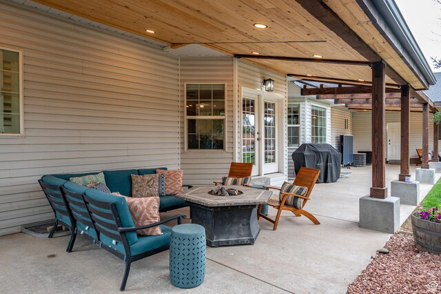 2271 W Crestview Cir, Cedar City, UT 84720 - view of patio with a grill, french doors, and an outdoor living space with a fire pit