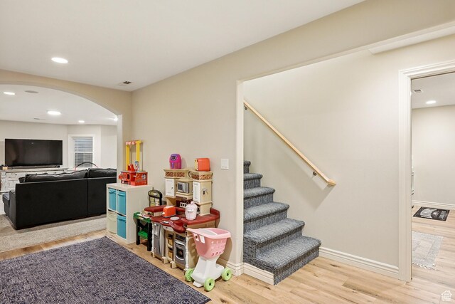 2271 W Crestview Cir, Cedar City, UT 84720 - playroom with arched walkways, wood finished floors, recessed lighting, and baseboards
