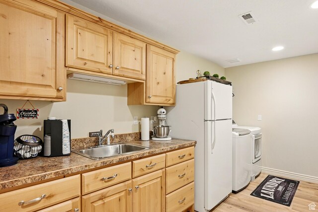 2271 W Crestview Cir, Cedar City, UT 84720 - kitchen featuring a sink, light brown cabinetry, washer and dryer, light wood-style floors, and recessed lighting