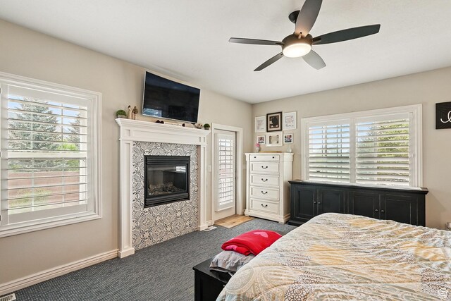 2271 W Crestview Cir, Cedar City, UT 84720 - bedroom with a premium fireplace, carpet floors, ceiling fan, and access to exterior