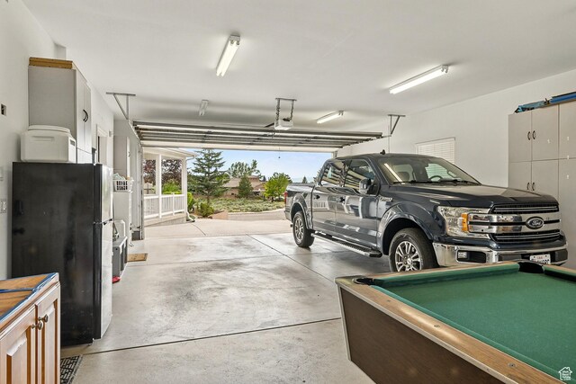2271 W Crestview Cir, Cedar City, UT 84720 - garage featuring freestanding refrigerator