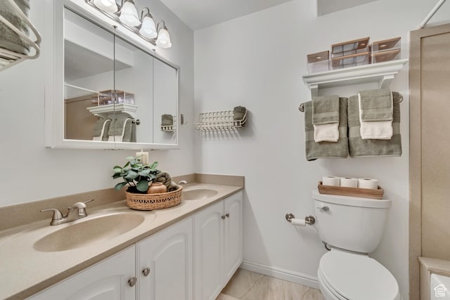 1030 S Orem Blvd Unit 23, Orem, UT 84058 - bathroom with toilet, marble look tile flooring, double vanity, and a shower