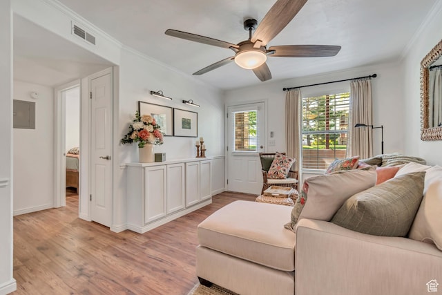 1030 S Orem Blvd Unit 23, Orem, UT 84058 - living room with light wood finished floors, ceiling fan, ornamental molding, electric panel, and baseboards
