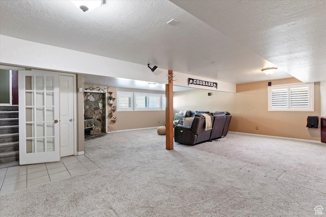 4456 N 3800 W, Peterson, UT 84050 - tiled living room featuring carpet floors, a textured ceiling, stairs, and baseboards
