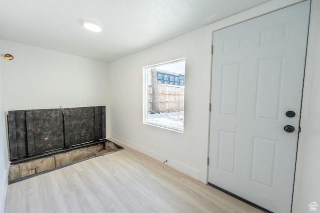 2202 S Lake St, South Salt Lake, UT 84106 - unfurnished room with wood finished floors and baseboards
