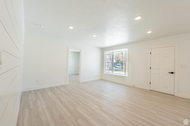 2202 S Lake St, South Salt Lake, UT 84106 - spare room with light wood-style flooring, recessed lighting, and baseboards