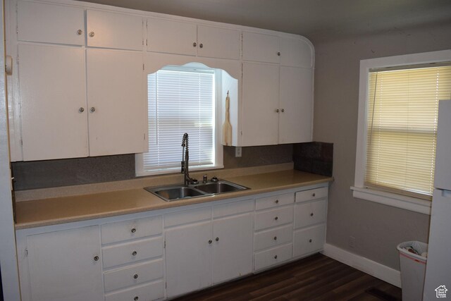 540 S 200 W, Logan, UT 84321 - kitchen with a sink, white cabinetry, and dark wood-type flooring