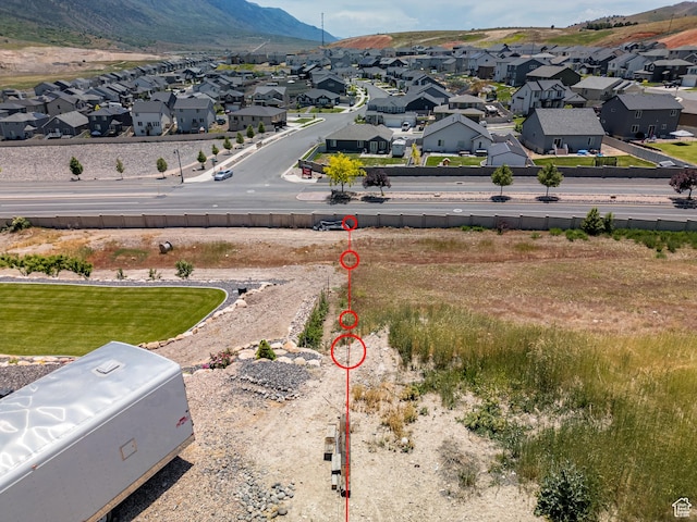 1353 Sageberry Dr, Santaquin, UT 84655 - aerial perspective of suburban area featuring a mountain backdrop