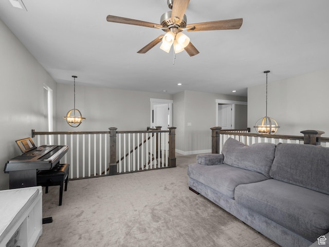 1353 Sageberry Dr, Santaquin, UT 84655 - living area featuring a chandelier, light colored carpet, ceiling fan, and recessed lighting