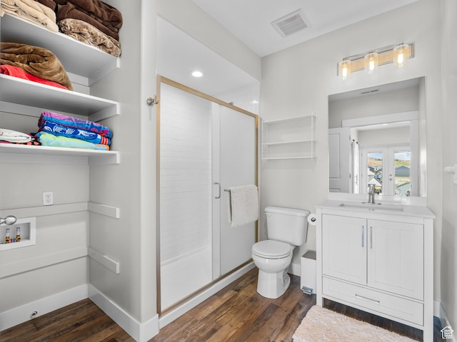 1353 Sageberry Dr, Santaquin, UT 84655 - full bath featuring wood finished floors, a shower stall, vanity, and recessed lighting