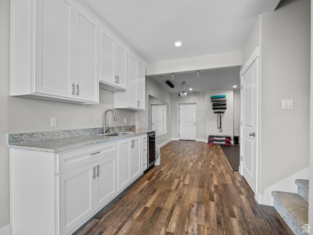 1353 Sageberry Dr, Santaquin, UT 84655 - kitchen with beverage cooler, white cabinetry, dark wood-type flooring, recessed lighting, and light stone counters