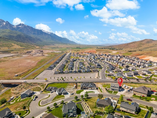 1353 Sageberry Dr, Santaquin, UT 84655 - aerial view of property's location featuring nearby suburban area and a mountainous background