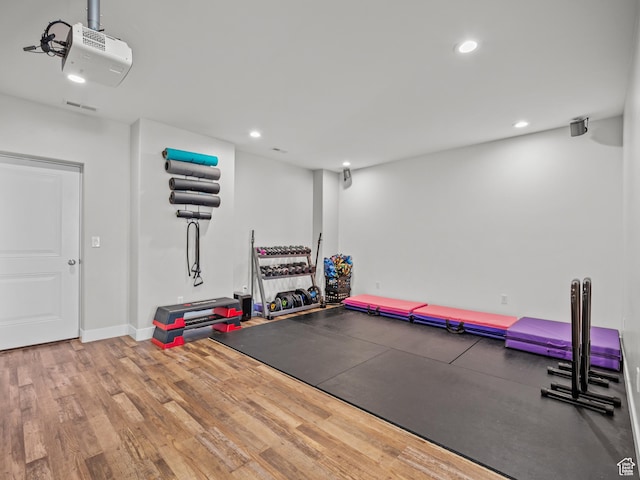1353 Sageberry Dr, Santaquin, UT 84655 - exercise area with wood finished floors and recessed lighting