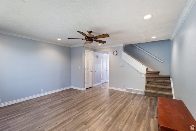 399 E 400 N Unit 2A, Bountiful, UT 84010 - unfurnished living room with recessed lighting, a ceiling fan, wood finished floors, stairs, and crown molding